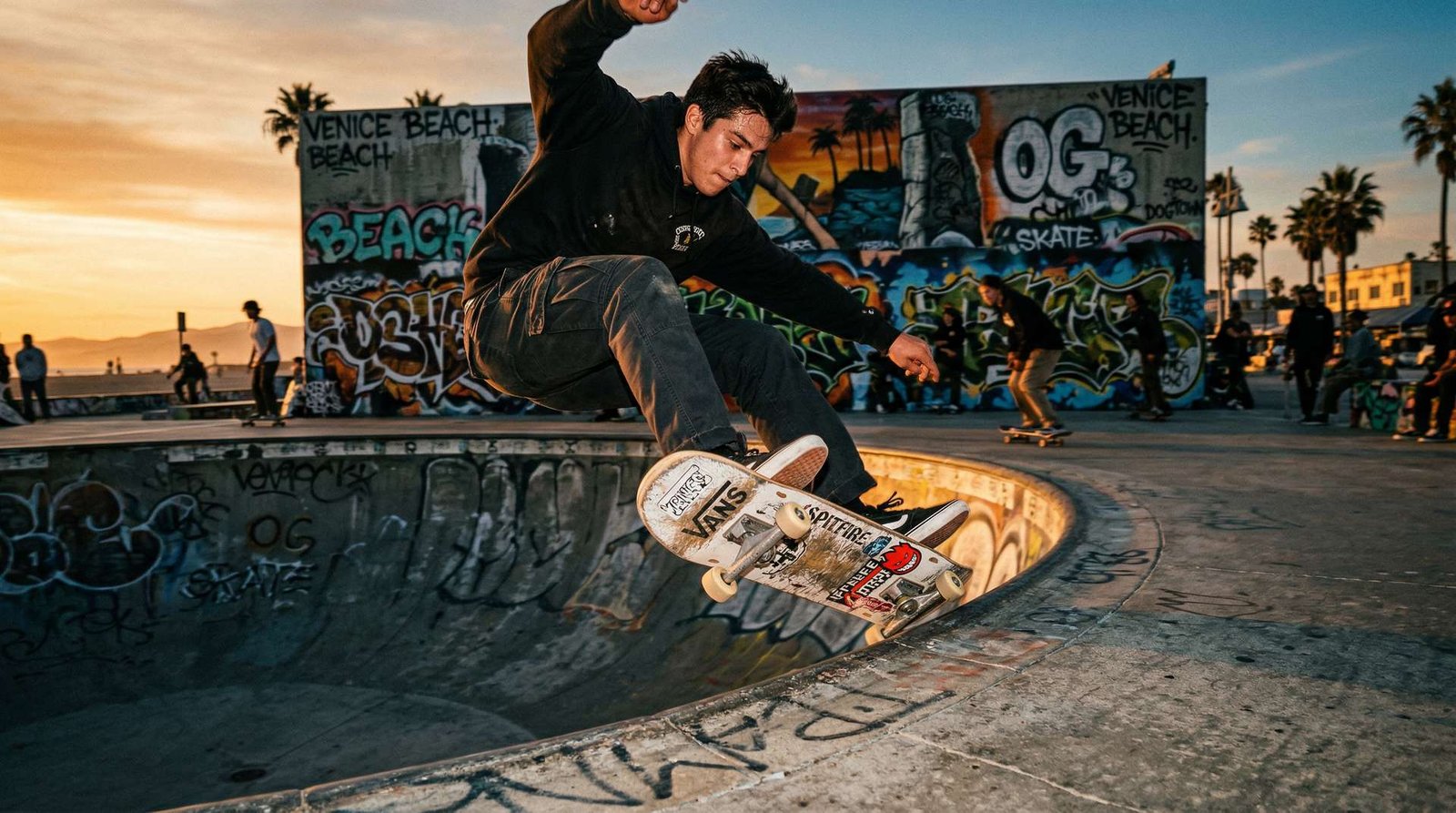 Skateboarder at Venice Beach skatepark bowl
